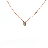 14k Rose Gold .75ct G SI1 Round Diamond Solitaire with Halo Necklace.